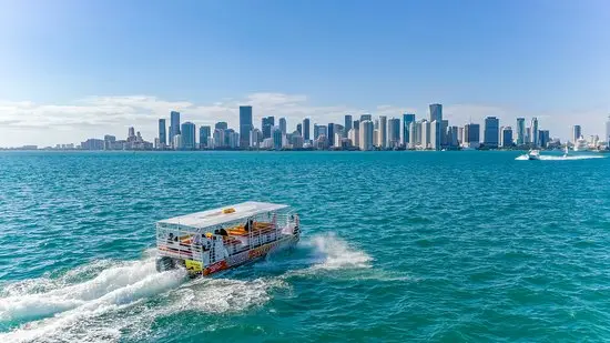 Sightseeing boat crossing Biscayne Bay in front of the Miami skyline